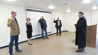 New supervisors, DA sworn in